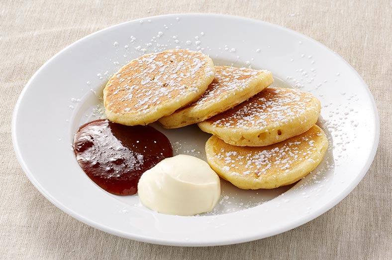 Pancakes with jam and cream