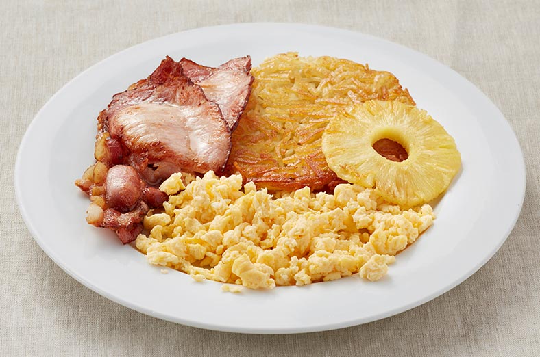 Scrambled egg, hashbrown, bacon, pineapple