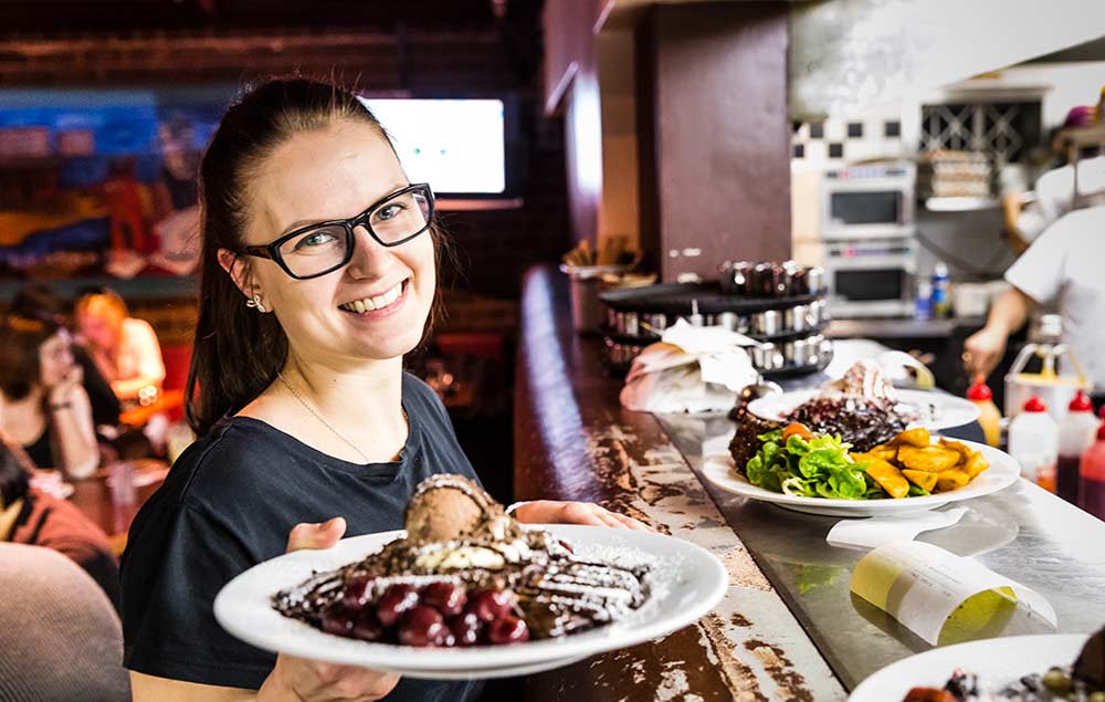 Waitress with a pizza